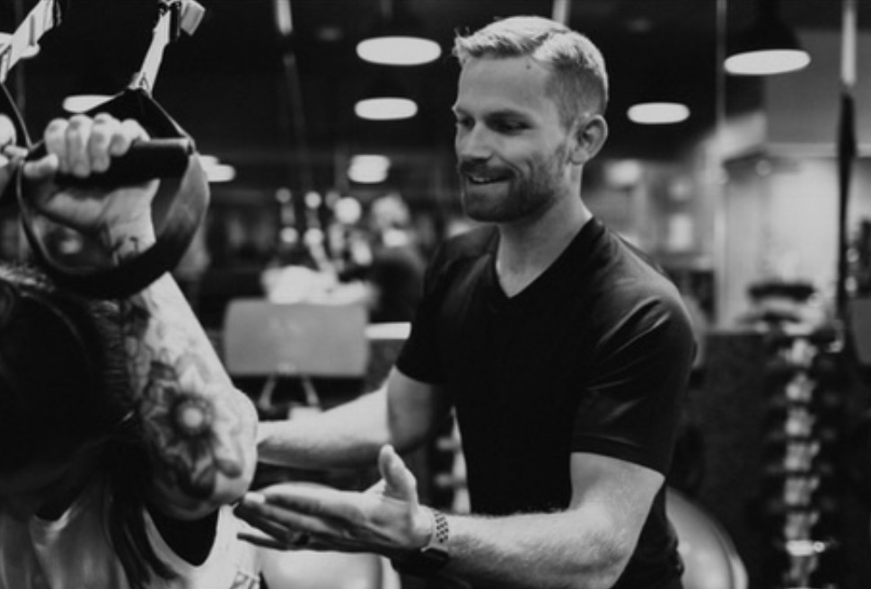Kelley Millsap coaching a client through a training session